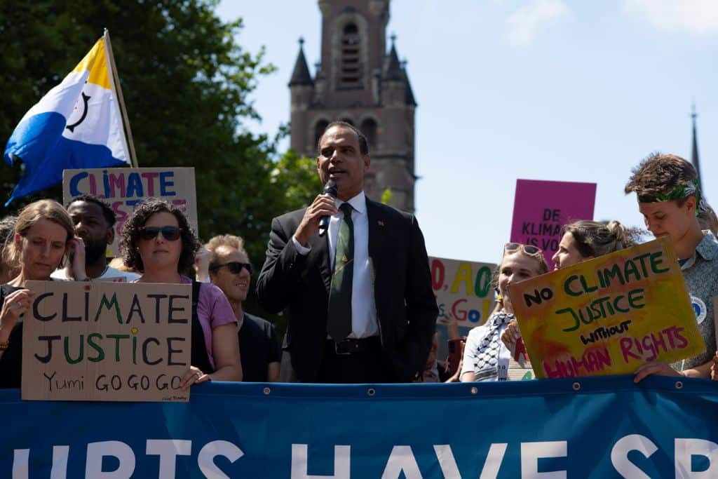 Ralph Regenvanu, Minister for Climate Change, Energy, Meteorology, Geohazards, Environment and Disaster Management for the Republic of Vanuatu, speaks in front of the Peace Palace in The Hague ahead of the court's delivery of its advisory opinion on climate change on July 23, 2025.