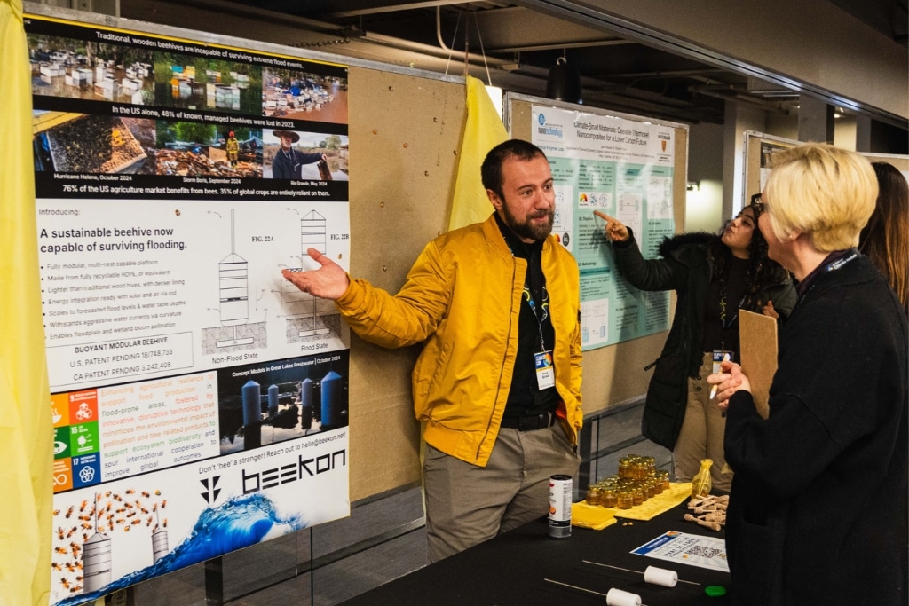 Konrad Borowski presenting the model for the Beekon hive at Climate Con in February 2025.