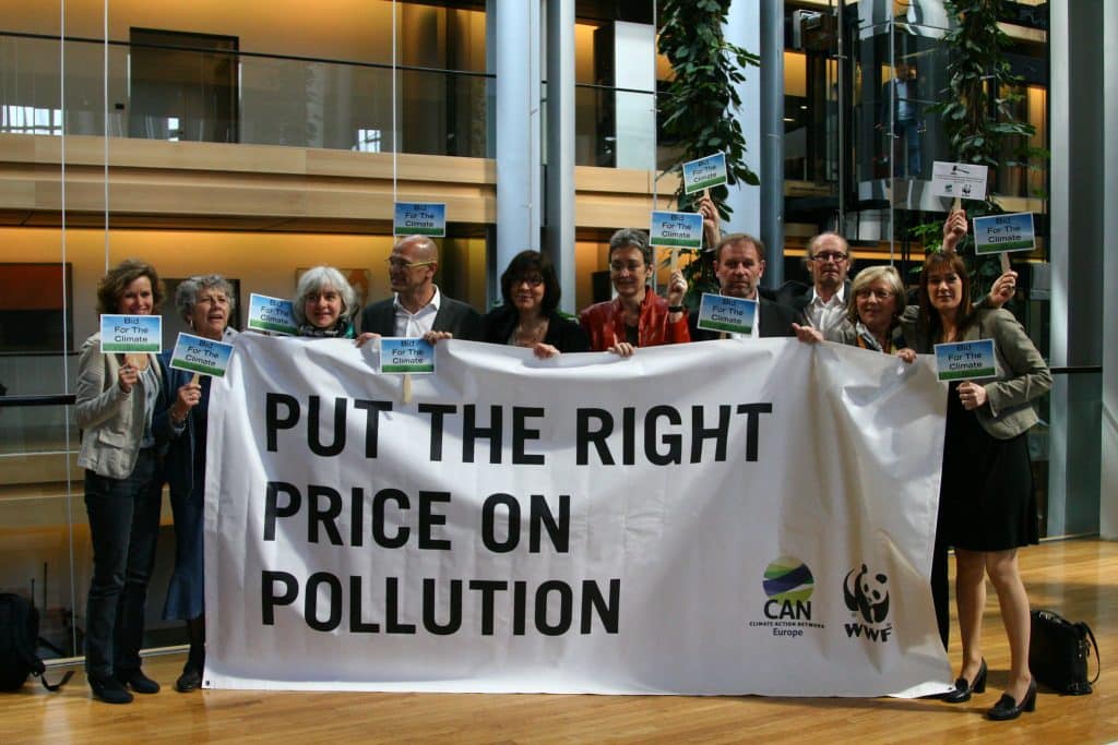 Green MEPs protest outside the European Parliament in Strasbourg ahead of a vote on "backloading", to address the oversupply of emissions allowances which has led to a collapsed carbon price.